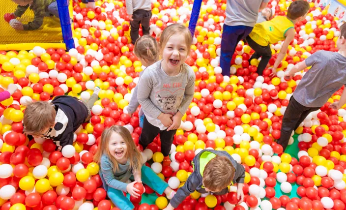 Kids playing in the ball pit at Off the Wall Kidz